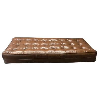 Tufted leather cushion